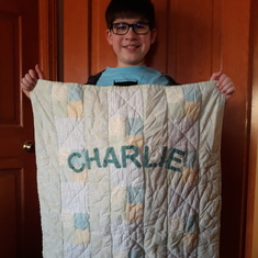 Baby quilt from Nancy given to grandson Charlie