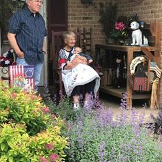 Nan and Pap with Channing front porch. Love this picture