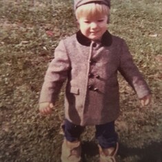 Neil at age 2 in his daddy's boots.
