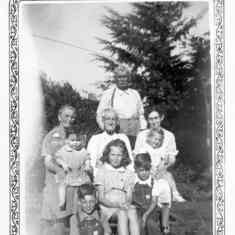 Nancy (center) with grandparents and siblings