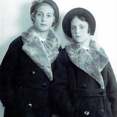 Naomi (left) and sister Mika wearing new coats bought for their move to the US in 1945