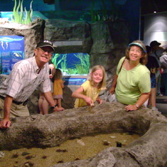 Grandpa, Hannah and grandma Elayne at the Corpus Aquarium 2005