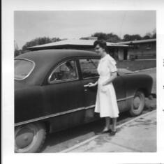 Nap's note on back - 'Mom with 1949 ford that I drove' 1961