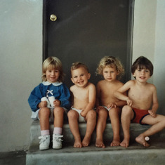 Sweet Natalie, my cousin Alex, me and my cousin Josh posing for pictures in my backyard in La Jolla. Clearly, Natalie was the only smart one, fully dressed! haha