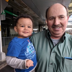 Reuniting with grandson at airport