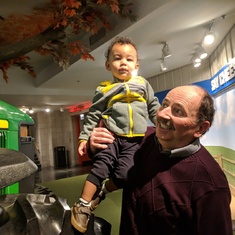 Visiting farm exhibit with grandson