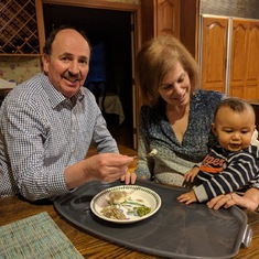 Feeding grandson at home