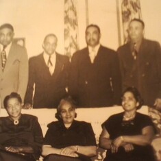 Brothers and Sisters; Nellie seated on the far right. 
