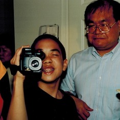 Eric recording Matthew Wang's 1st birthday in 1995