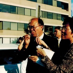 Nelson and Karen blowing bubbles at wedding in 2001