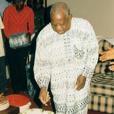 Pa Cutting his 80th birthday cake