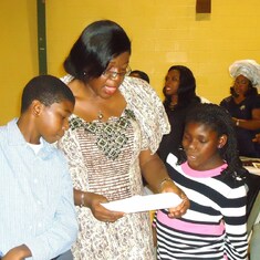 Mrs Ama Zuofa-Erefah with children at the Service of Songs for Pa Newton Igali in Atlanta, GA 11/10/2012.