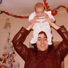 1974 - A proud daddy, but I shouldn't have let it go to my head. Poor Nic!