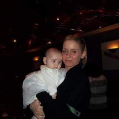 Nic with baby pheobe at her christening 