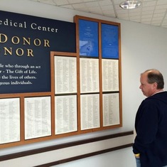 Dad viewing Nick's name on the Donor Wall of Honor at University Of Maryland Medical Center