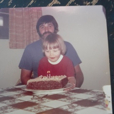 Me and dad on my 2nd birthday