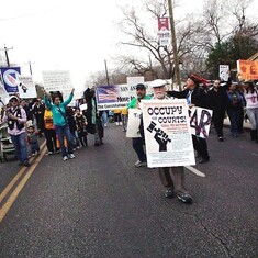 Leading the OCCUPY group during the annual MLK  March, protesting Citizens United.