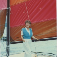 posing on a catamaran at Lake Cavenaugh