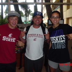 Niel, Nick, and Courtney two Coug fans and one Husky fan