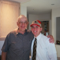 Niel and grandpa at the graduation party