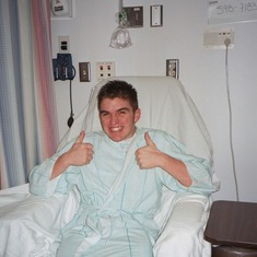 Before Niel's first shoulder surgery...two thumbs up!