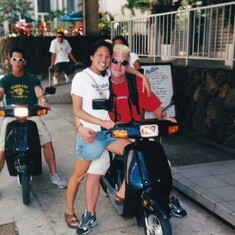 Ellen and Niel on scooters in Hawaii