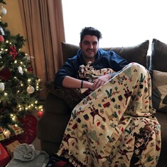 Niel's new favorite Christmas blanket from Aunt Paula