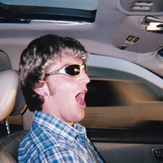 Niel singing in the car at the top of his lungs...not always well...but always with gusto!