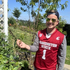 Nick representing Niel with his Coug shirt while releasing butterflies for Niel's 3rd heavenly birthday...go Cougs!