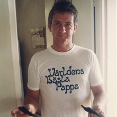 Shirt says: "Worlds Greatest Dad"... So True!