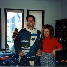 Christmas 1995 Keith & Nina Maire horsing around showing off new clothes