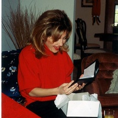 Christmas 1995 – Nina Marie appears to be pleased with new gift