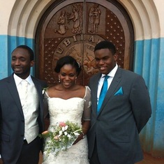 On her wedding day with hubby and Onyii 