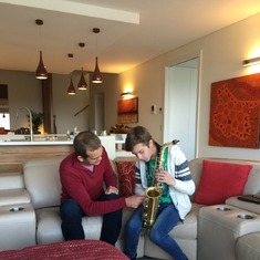 Teaching my son to play Sax - a very patient man!