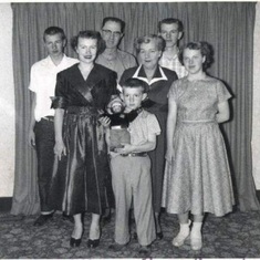 1950 Family pic My Dad far left @16 years old Robert center front only one amoung us as of 9/20/21