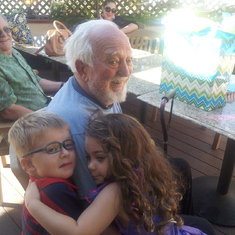 Grandpa Norm at his 87th birthday party with two of his great grandchildren