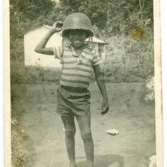 We visited Major Samuel Osaigbovo Ogbemudia, and here, Nowa is wearing his battle helmet circa 1968