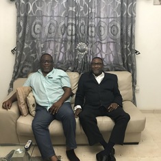 Obi with his brother Eric on a trip to Nigeria