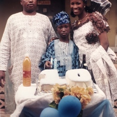 Daddy, Mummy and Dayo during the children birthday 