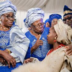 Giving advice to Kunbi at her traditional wedding 