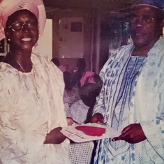 Mr. Olufemi Micheal Ogunbiyi with his wife Mrs. Modupe Ogunbiyi(late) at their daughter's wedding.