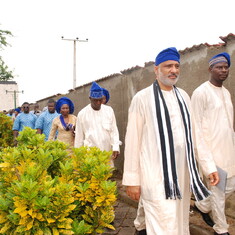 Dr. Femi with brother-in-law, Simon Gusah, on the way to his father-in-law's interment. July 2014