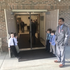 Holding the door at kingdom hall