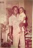 Young Omoloye with a very young Oyeniyi (second son) in Lagos Nigeria