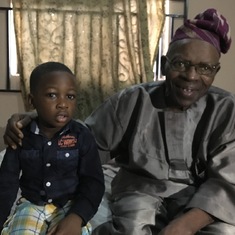 Omoloye with one of his grand son