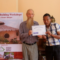 Owen giving certificates of completion to Nepali students