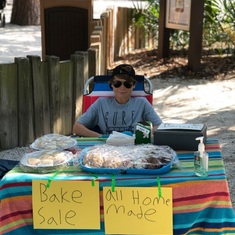 Our young entrepreneur. Bake sale anyone?