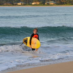 Owen catching waves at Hanalei 