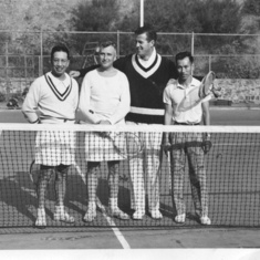 1940's:  Owen Loui with fellow tennis players at net