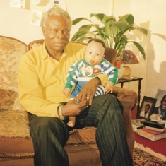 Prof Oyeleye Oyediran with his first grandson Ayo Awojobi - Fulham UK